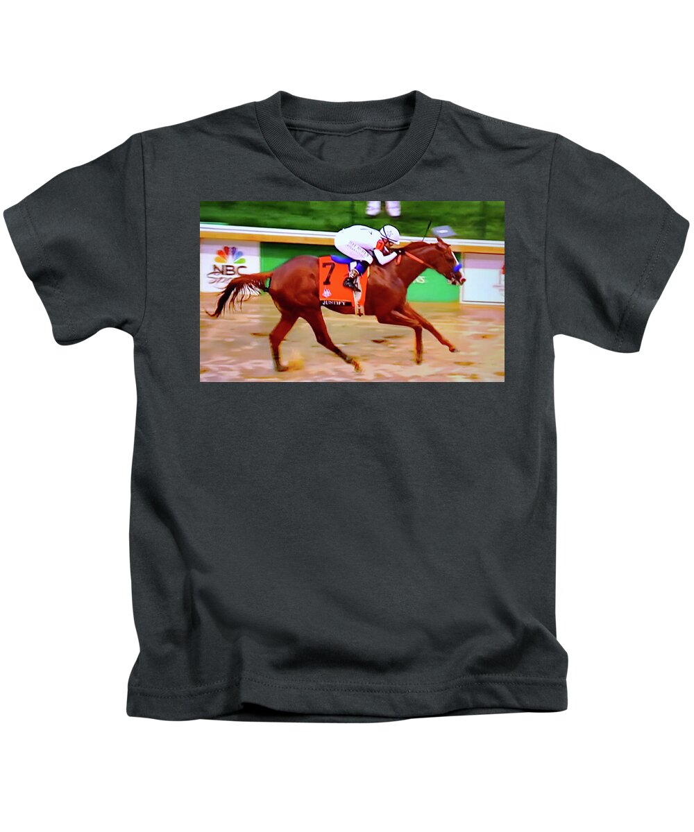 Justify Kids T-Shirt featuring the photograph Justify wins in the mud by Imagery-at- Work