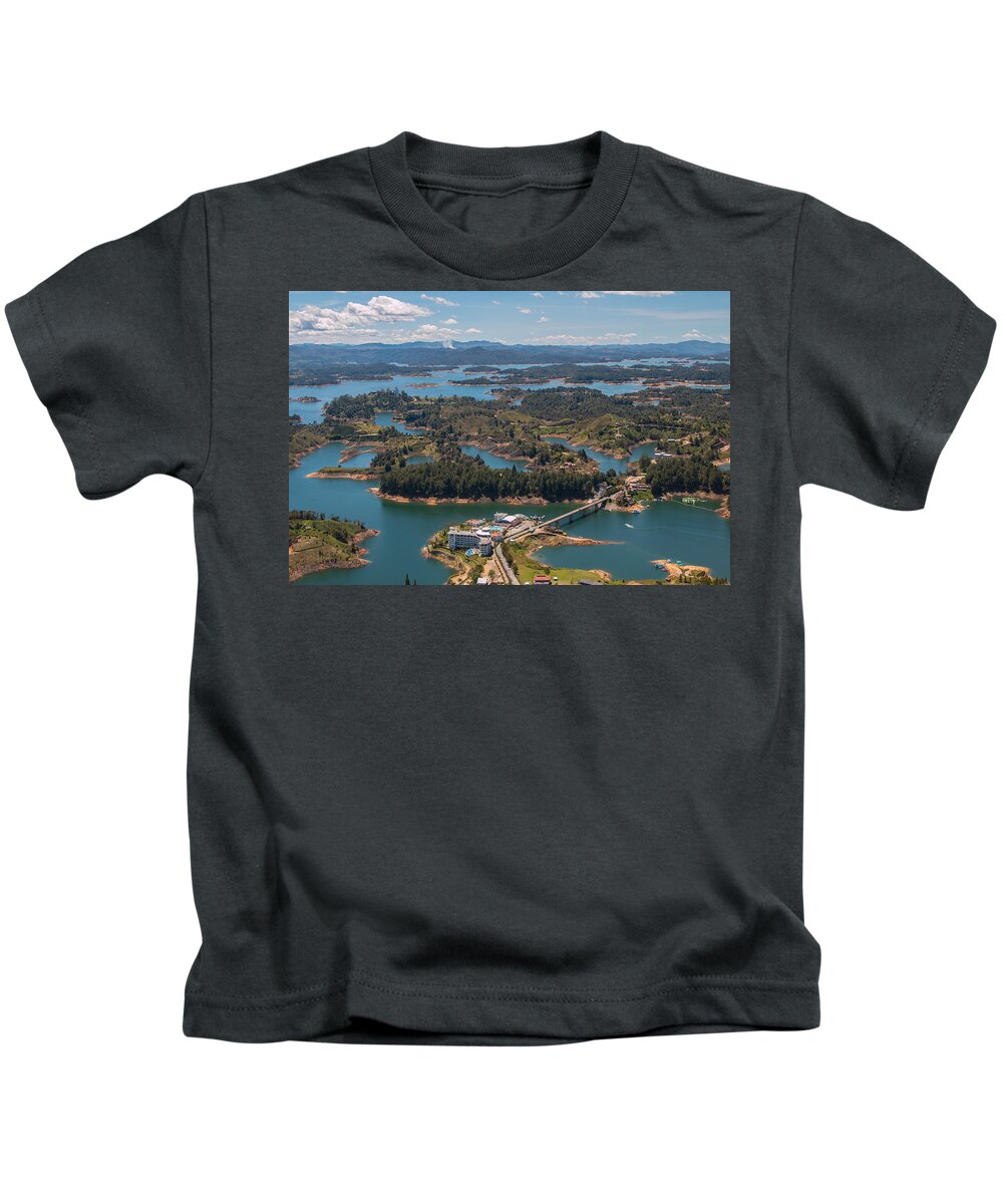 Lakes Kids T-Shirt featuring the photograph Lake Guatape Resort by Robert McKinstry