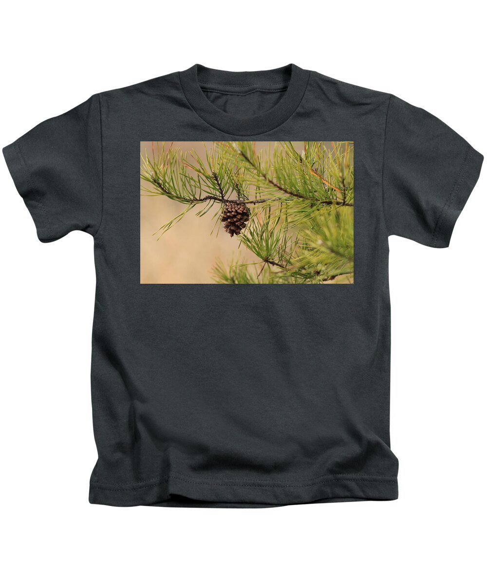 Pine Cone Kids T-Shirt featuring the photograph Lone Pine Cone by Karen Ruhl