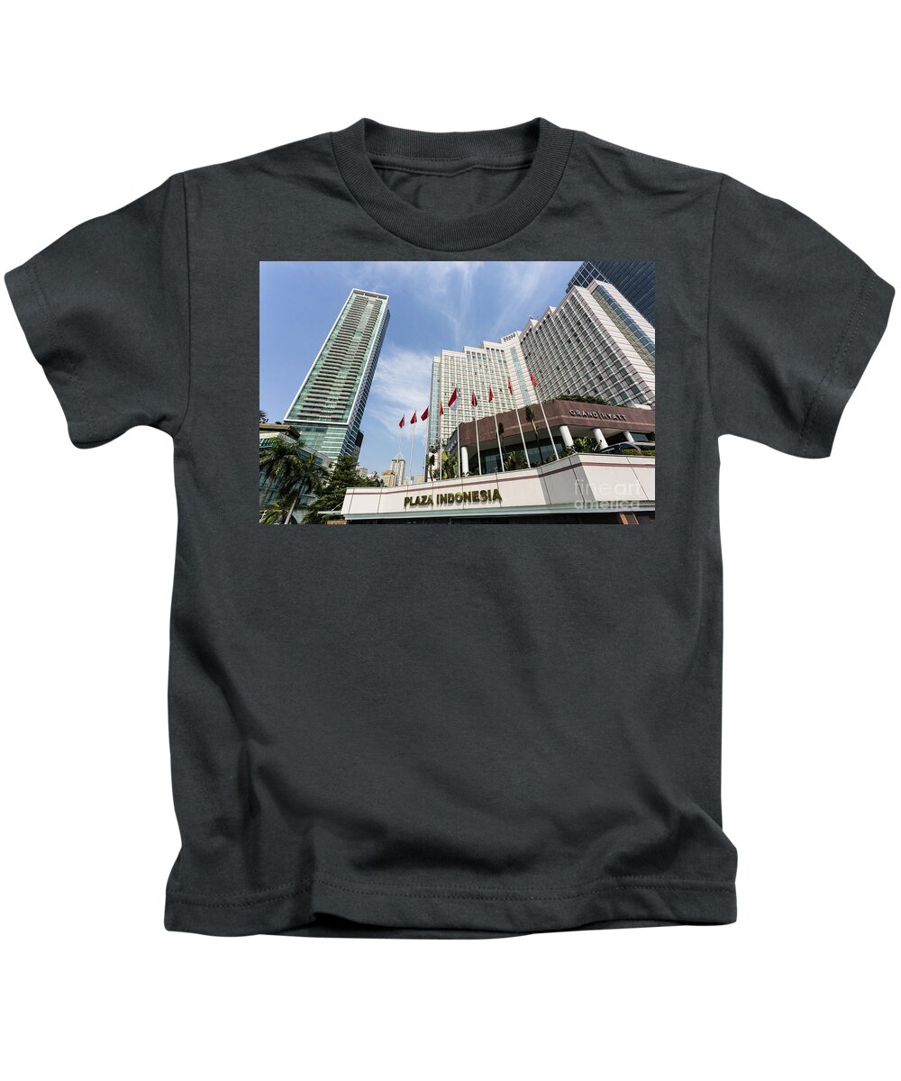 Gran Hyatt Kids T-Shirt featuring the photograph Luxury hotel in Jakarta, Indonesia capital city. by Didier Marti