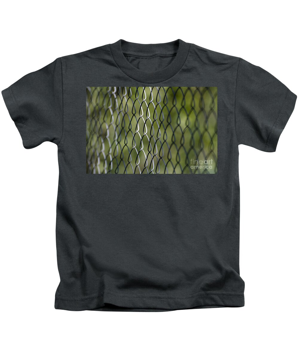 Fence Kids T-Shirt featuring the photograph Metal fence by Mats Silvan
