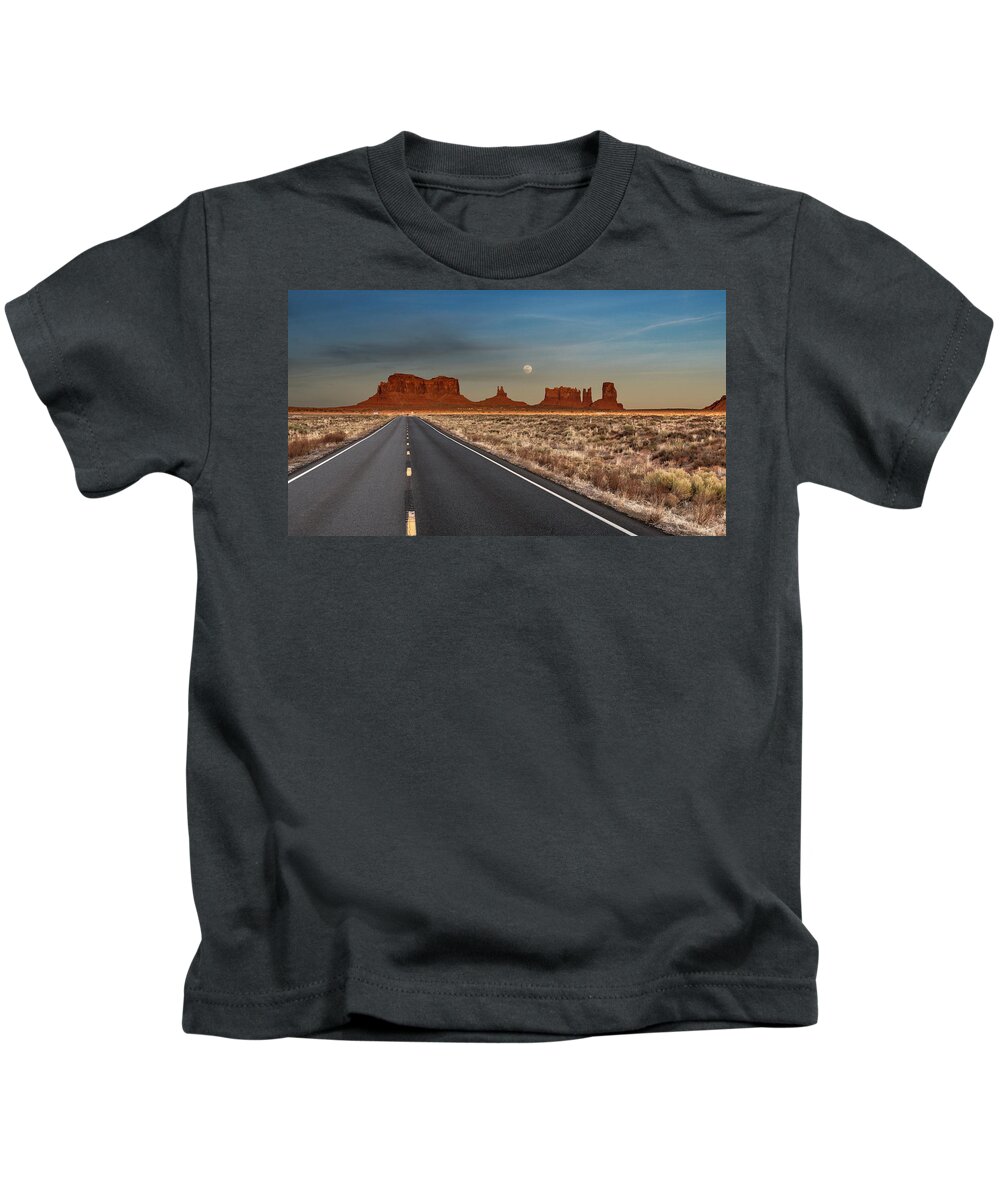© 2018 Lou Novick All Rights Reserved Kids T-Shirt featuring the photograph Moonrise over Monument Valley by Lou Novick