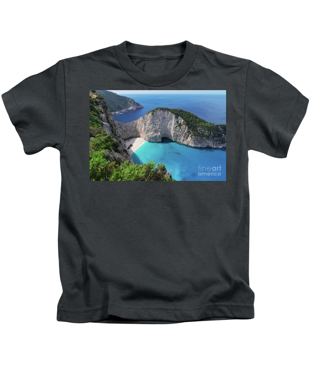 Navagio Kids T-Shirt featuring the photograph Navagio Beach by Anastasy Yarmolovich