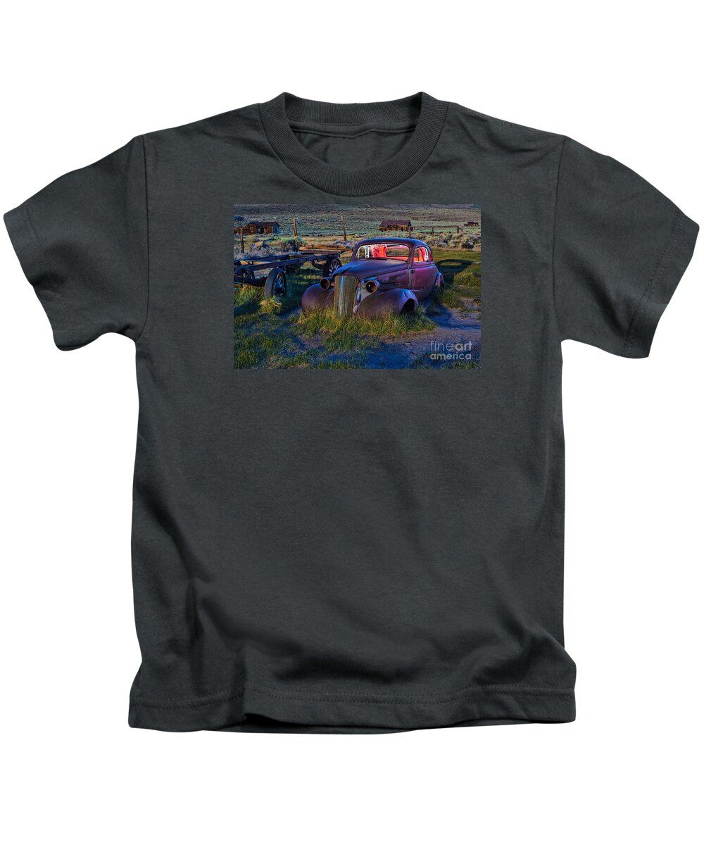 Bodie Kids T-Shirt featuring the photograph Old Bodie Car By Moonlight by Mimi Ditchie