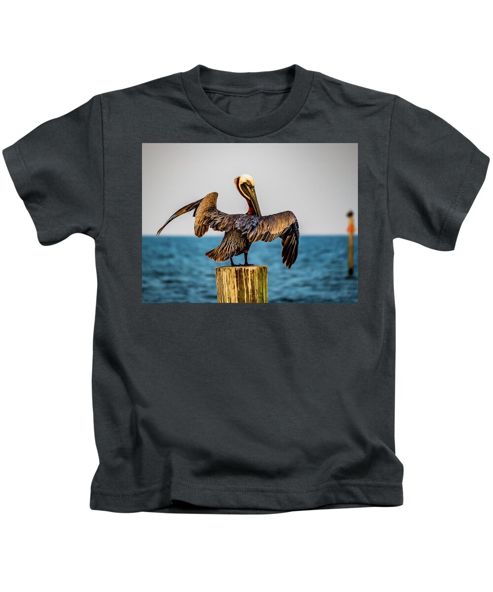 Pelican Kids T-Shirt featuring the photograph Pelican Stand Off by JASawyer Imaging