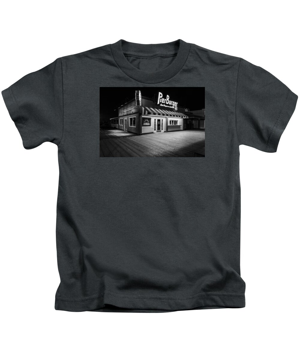 Santa Monica Pier Kids T-Shirt featuring the photograph Pier Burger Santa Monica Pier Black and White by John McGraw