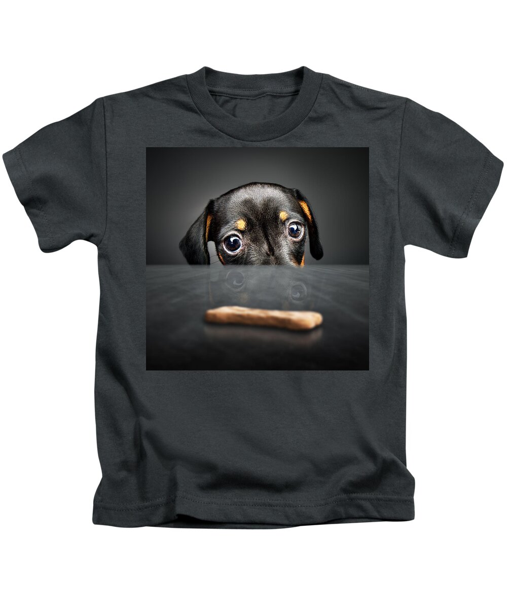 Puppy Kids T-Shirt featuring the photograph Puppy longing for a treat by Johan Swanepoel