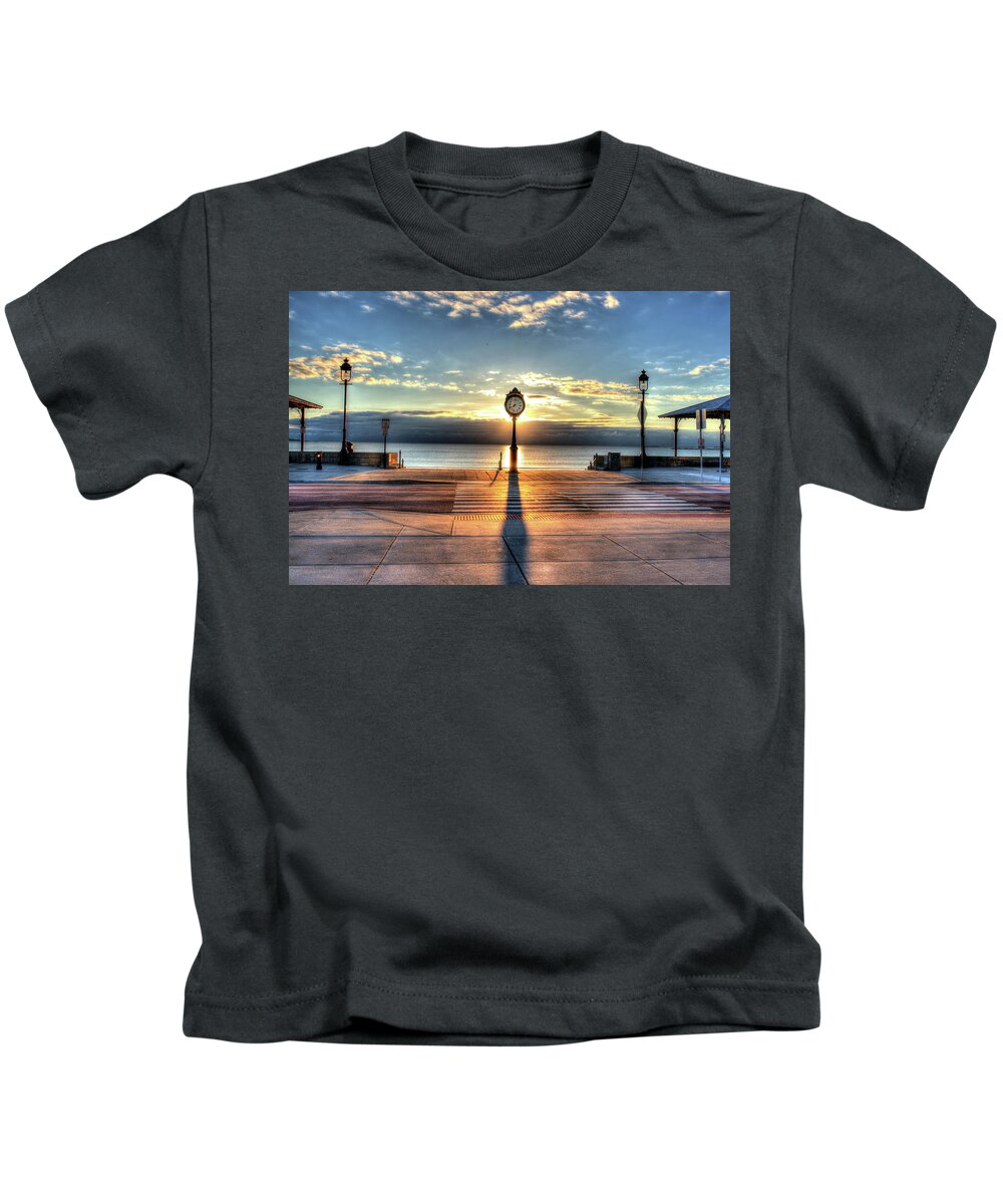 Revere Kids T-Shirt featuring the photograph Revere Beach Clock at Sunrise Long Shadow Revere MA by Toby McGuire