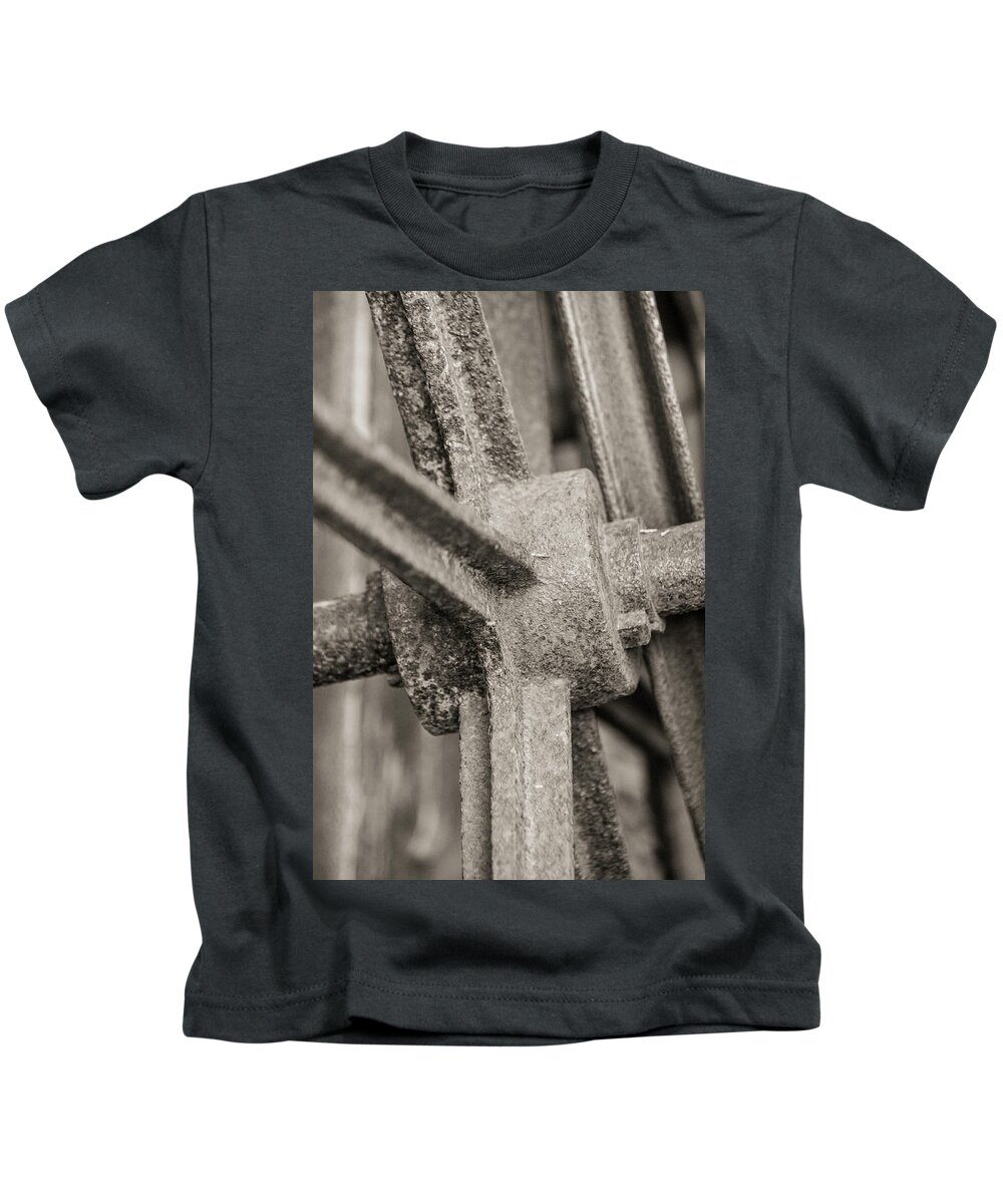 Wheel Kids T-Shirt featuring the photograph Rusted wheel by Jason Hughes