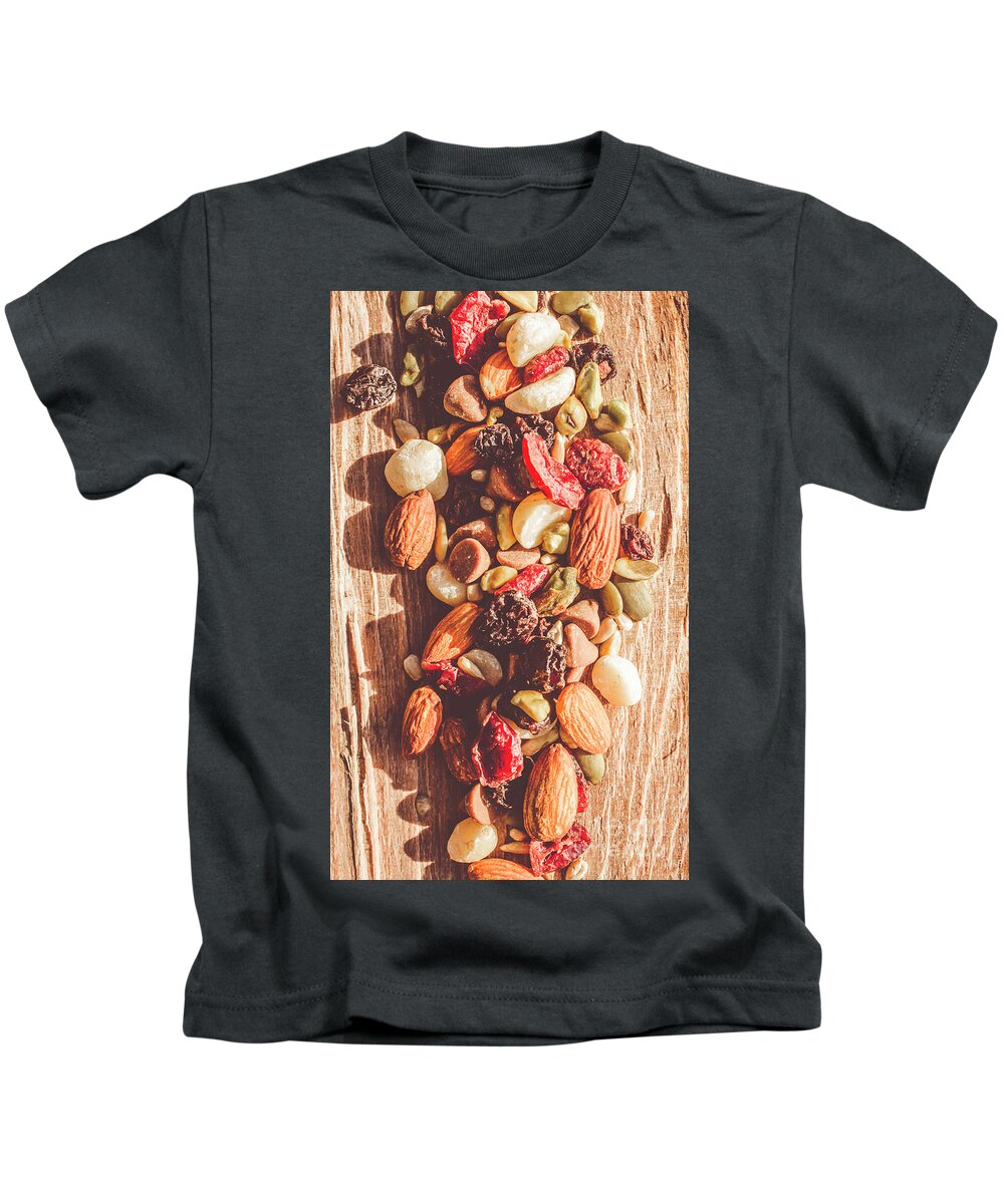 Rustic Kids T-Shirt featuring the photograph Rustic dried fruit and nut mix by Jorgo Photography