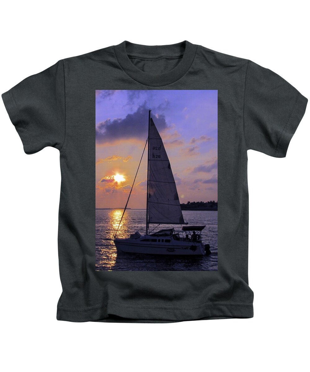 Sunset Kids T-Shirt featuring the photograph Sailing Home Sunset in Key West by Bob Slitzan