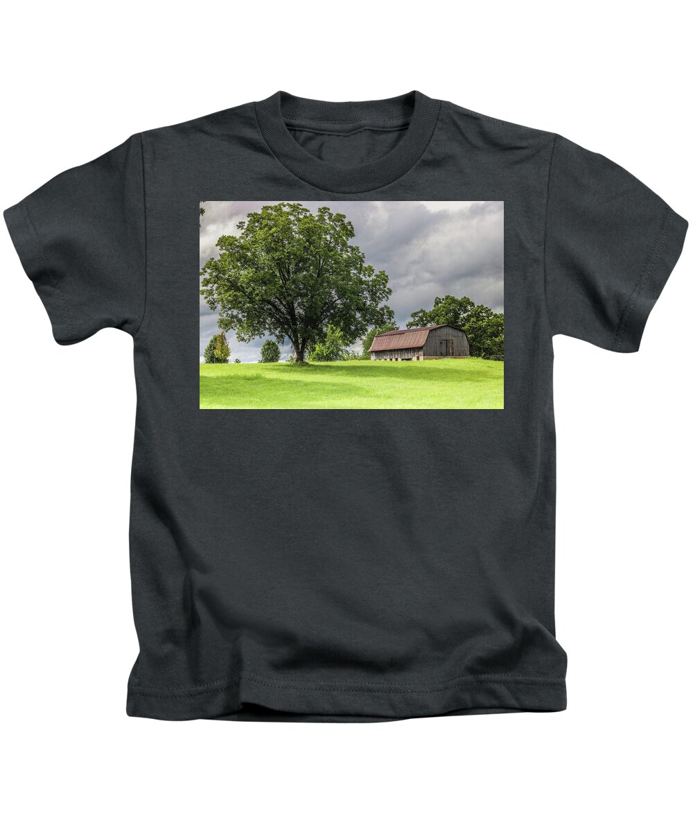 Barn Kids T-Shirt featuring the photograph Storm clouds by Dana Foreman