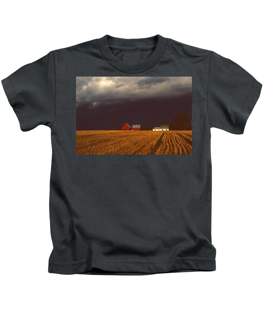 Field Kids T-Shirt featuring the photograph Storm Light At Great Village by Irwin Barrett