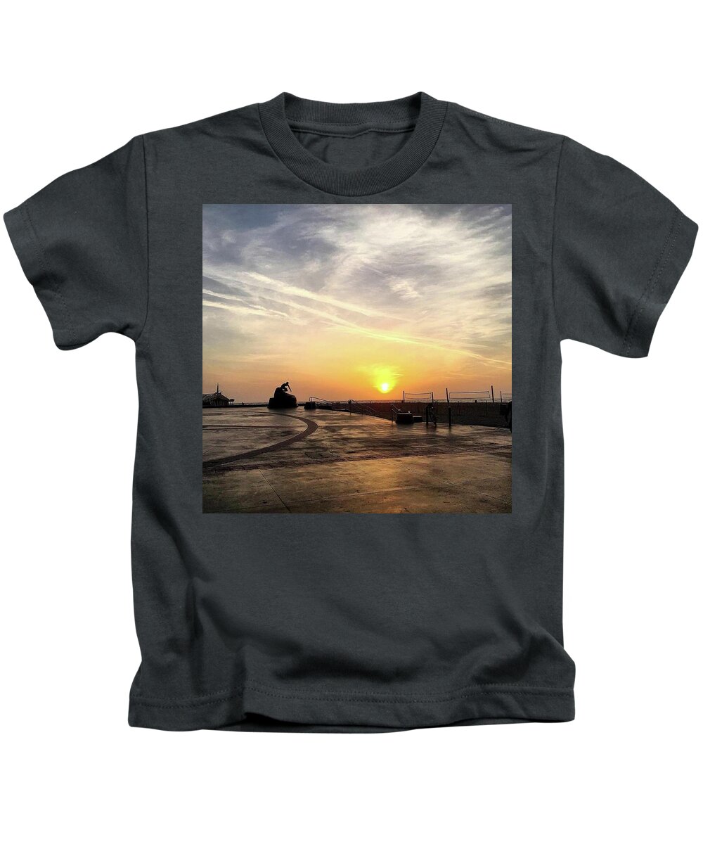California Kids T-Shirt featuring the photograph Sunset Surfer by Nancy Ann Healy