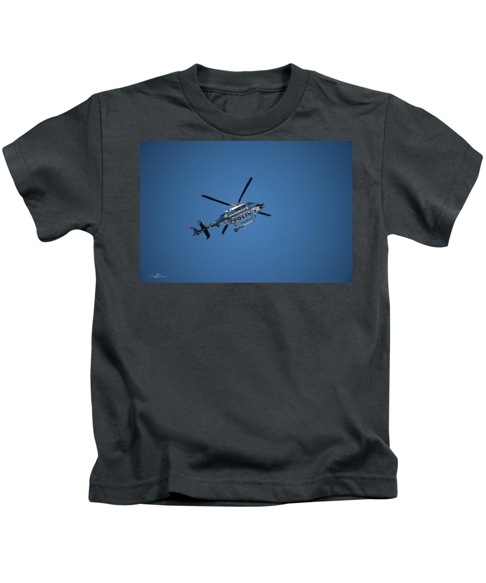 Swedish Police Helicopter Kids T-Shirt featuring the photograph The searcher in the air by Torbjorn Swenelius