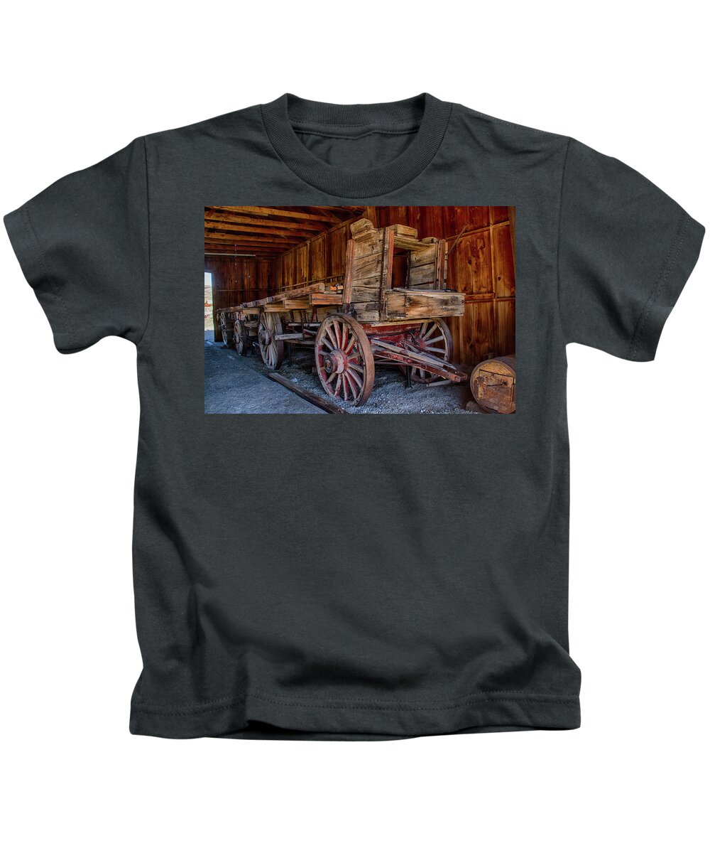 Bodie Kids T-Shirt featuring the photograph Two Flatbed Wagons by Guy Shultz