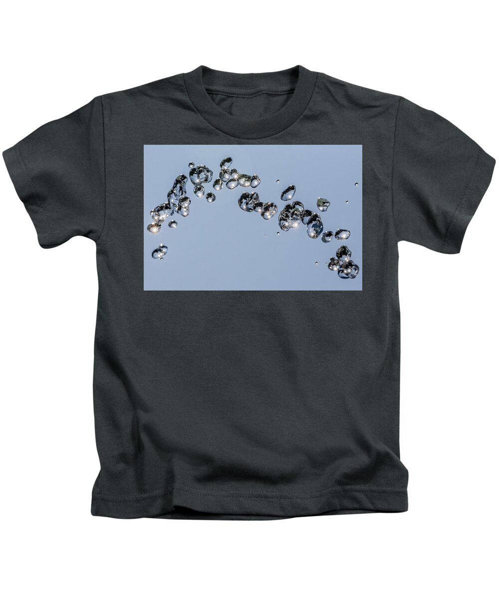Wolfgang Stocker Kids T-Shirt featuring the photograph Flying drops #1 by Wolfgang Stocker