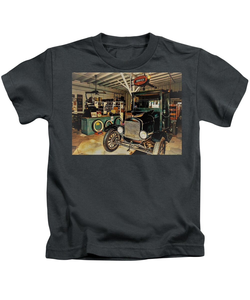 Tires Kids T-Shirt featuring the photograph My Garage by Randy Sylvia