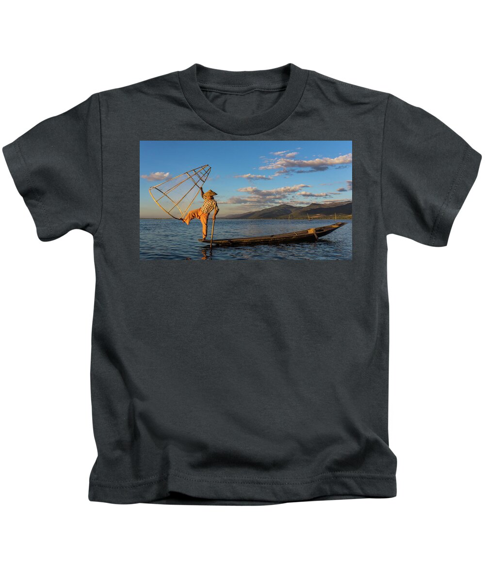 Fisherman Kids T-Shirt featuring the photograph Intha fisherman on Lake Inle in Myanmar #4 by Ann Moore
