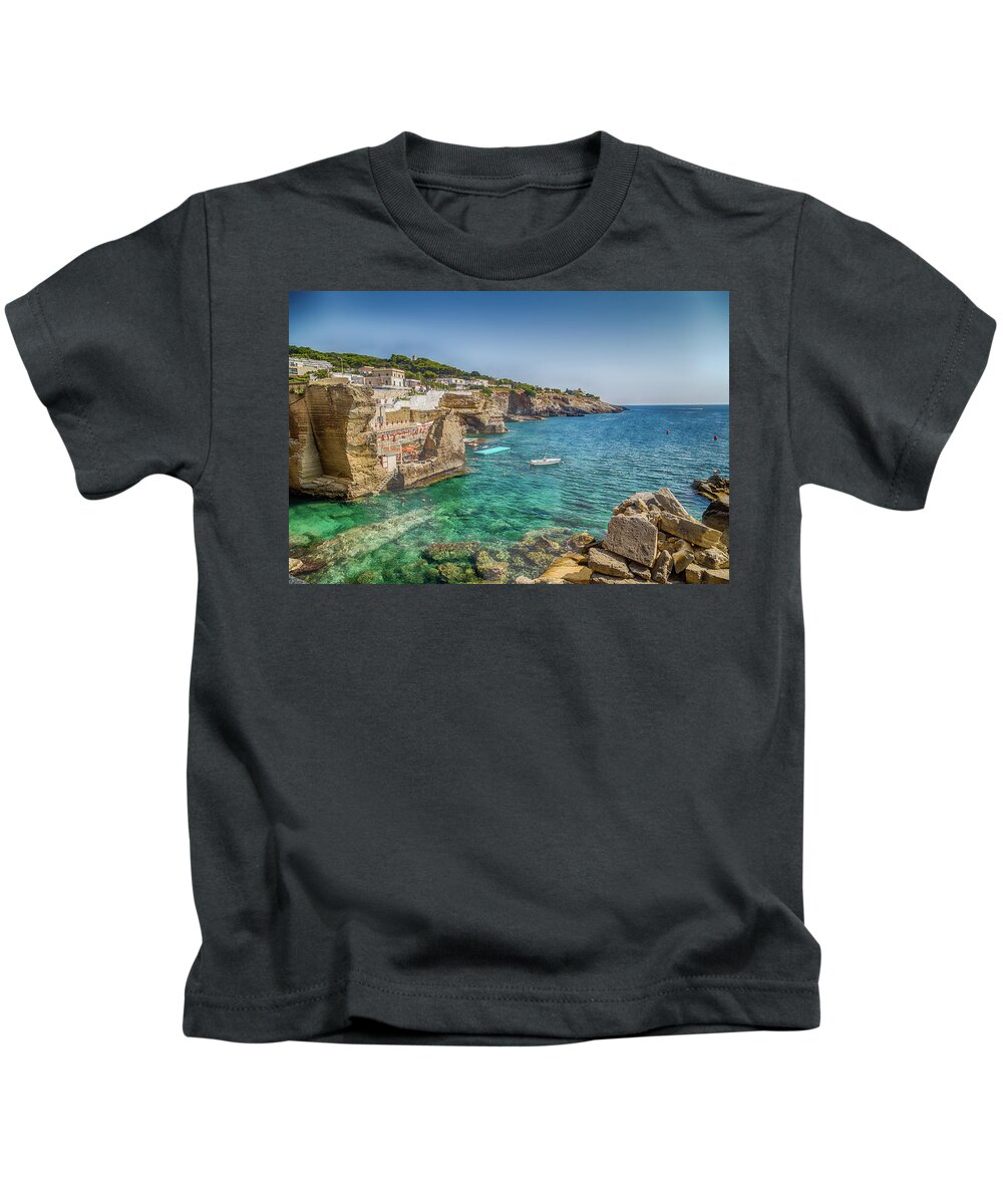Coasting Kids T-Shirt featuring the photograph Rocks and architecture on the Salento coast #3 by Vivida Photo PC