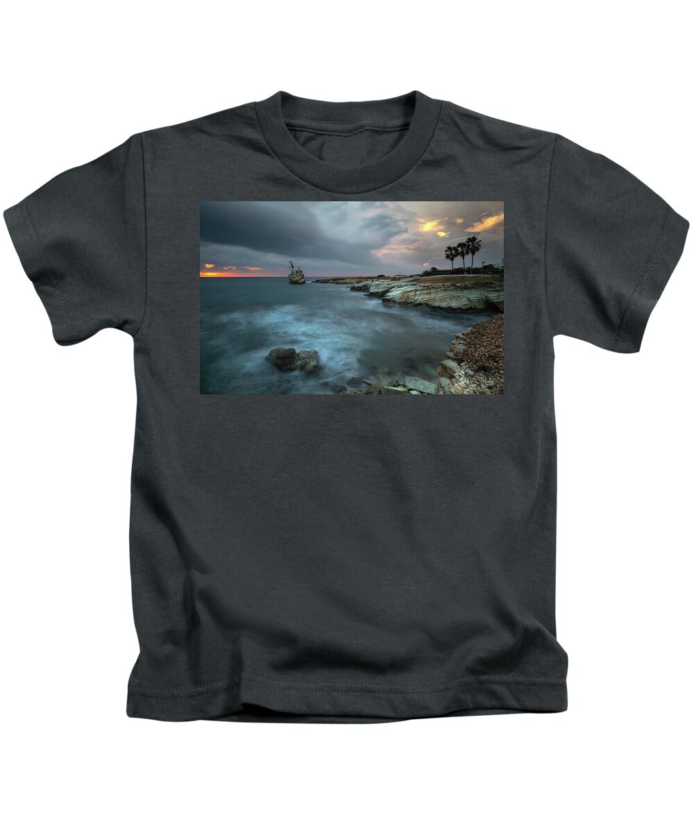 Coastline Kids T-Shirt featuring the photograph Abandoned ship of EDRO III resting on the coastline of Peyia in by Michalakis Ppalis