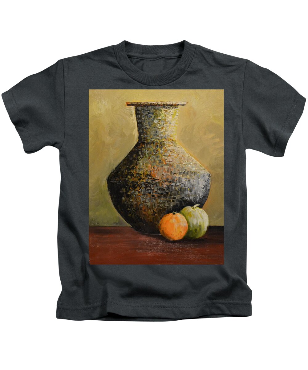 This Is An Oil Painting Of A Large Vase With Two Pieces Of Fruit. I Used A Knife To Create The Large Vase To Show Texture. There Are Several Colors Used For The Vase. The Dark Colors Reveal The Shadows In The Vase. The Vase Is Sitting On A Medium Colored Table. I Also Used A Knife To Create The Orange And Green Apple. I Used A Light Color In The Background So The Objects Standout In The Painting. Kids T-Shirt featuring the painting Big Vase and Fruit by Martin Schmidt