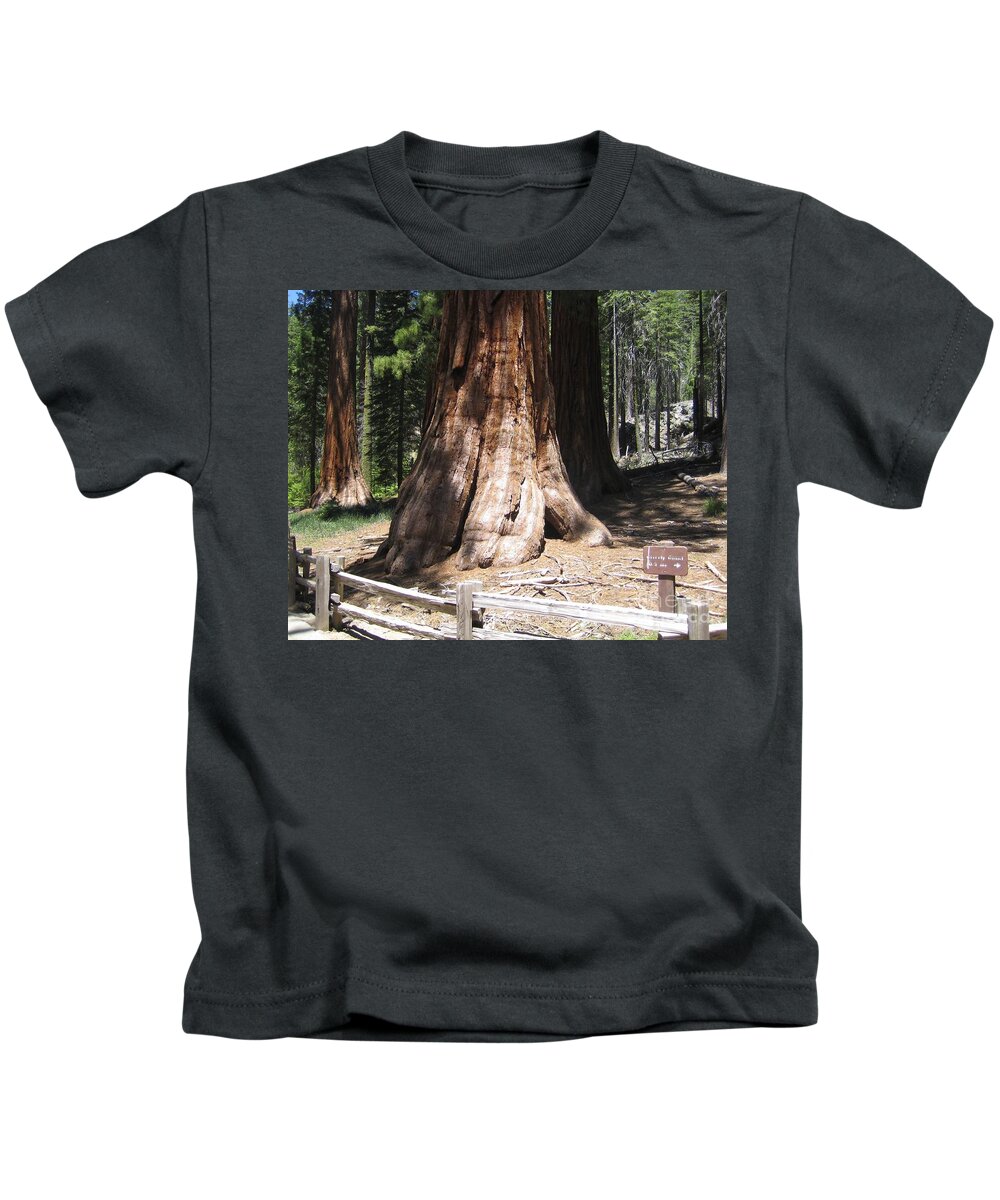 Yosemite Kids T-Shirt featuring the photograph Mariposa Old Tall Giant Tree Trunk Yosemite National Park by John Shiron