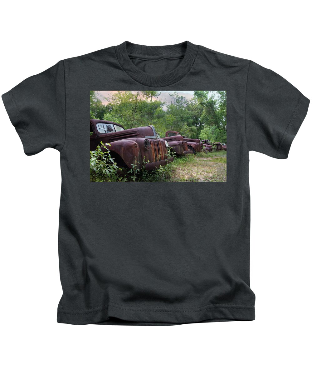 Antique Kids T-Shirt featuring the photograph One Man's Trash by Kelly Gomez