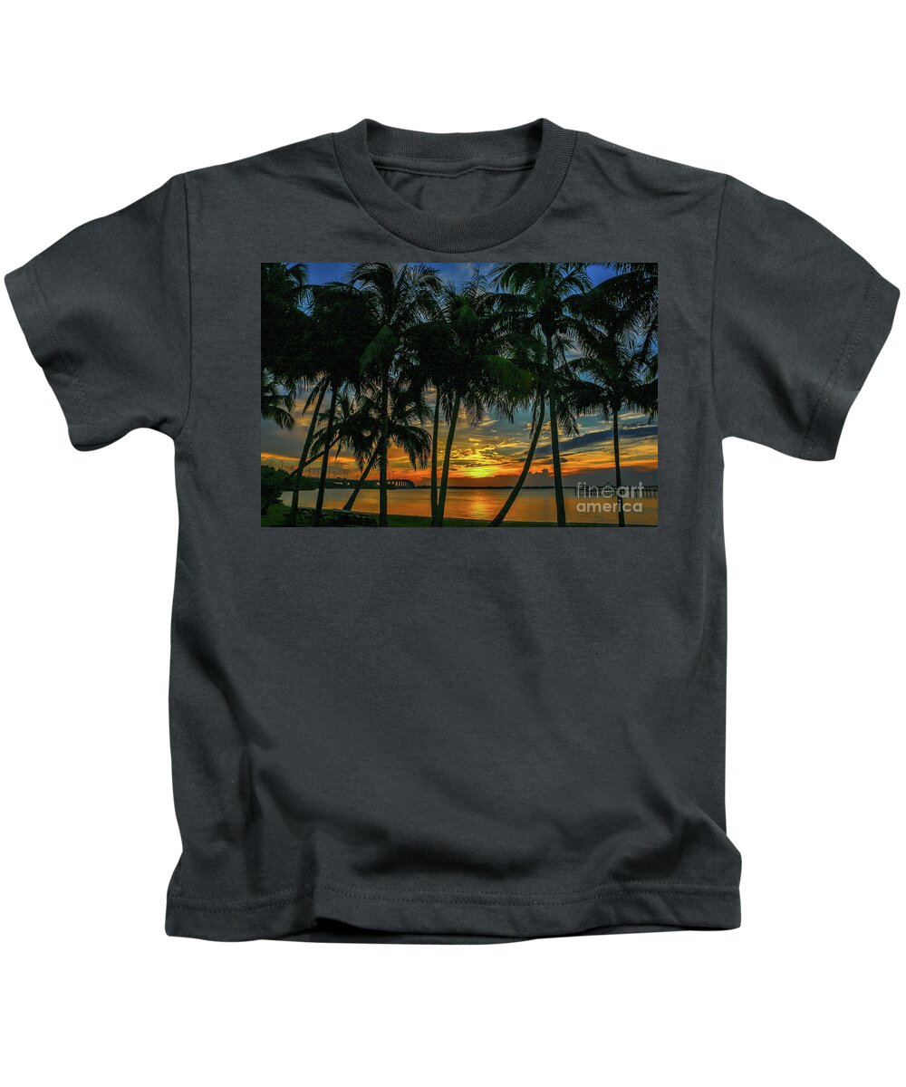 Palms. Palm Kids T-Shirt featuring the photograph Palm Tree Lagoon Sunrise by Tom Claud