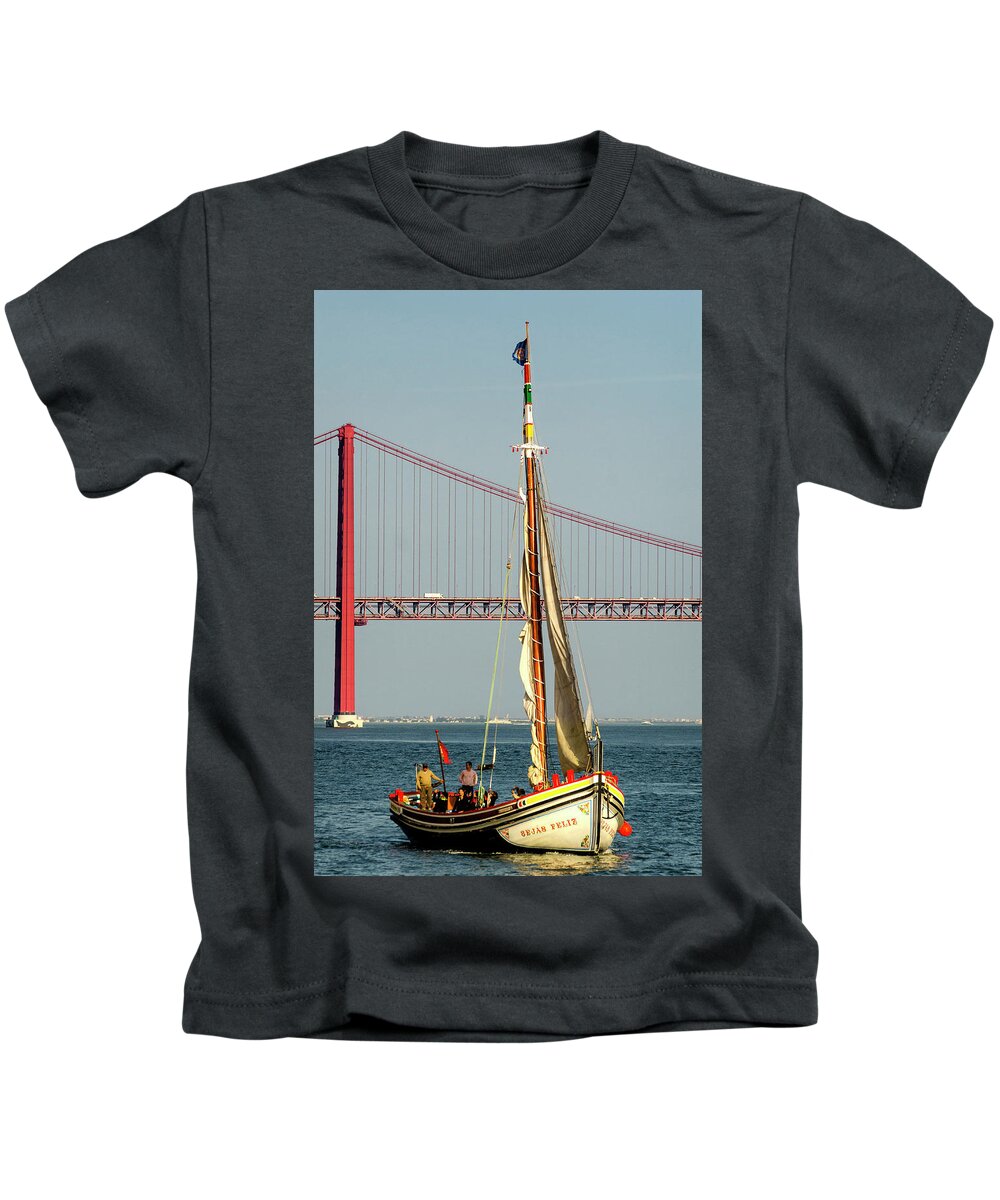 25 De Abril Bridge Kids T-Shirt featuring the photograph Sailing on the Tagus by Pablo Lopez