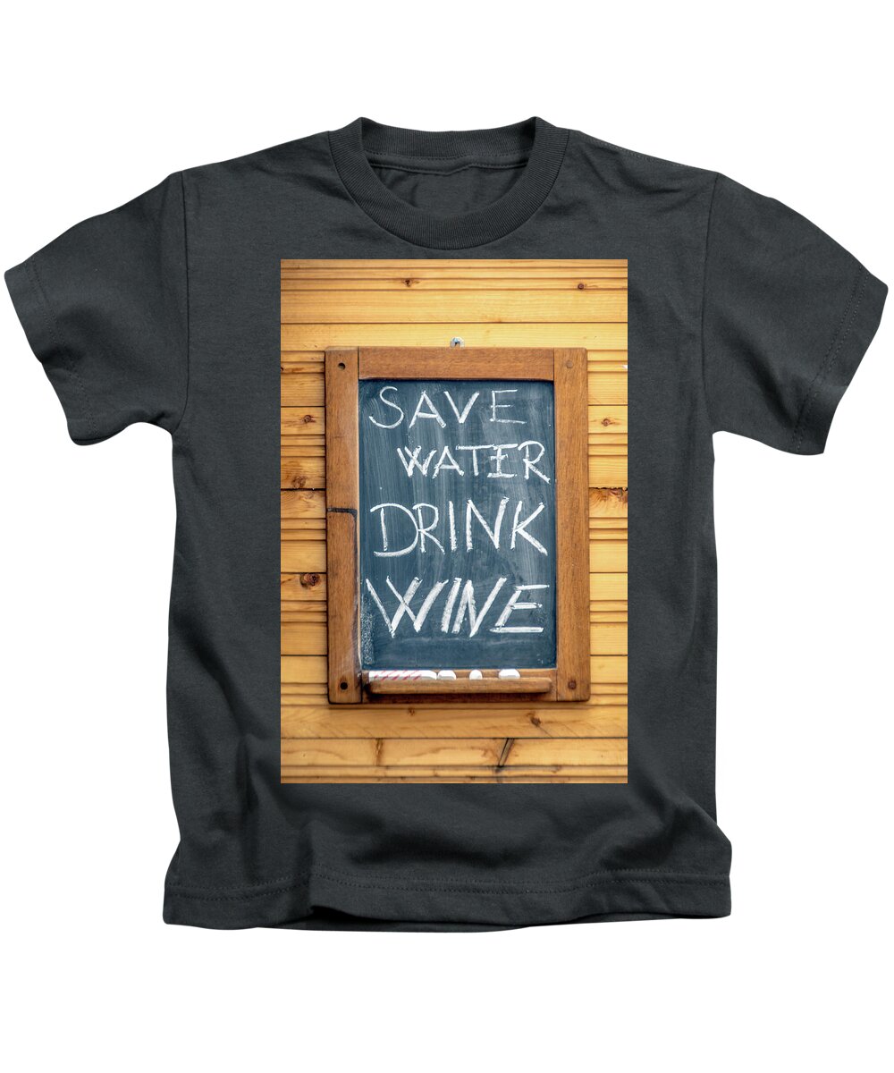 Chalkboard Kids T-Shirt featuring the photograph Save Water and Drink Wine by Tito Slack