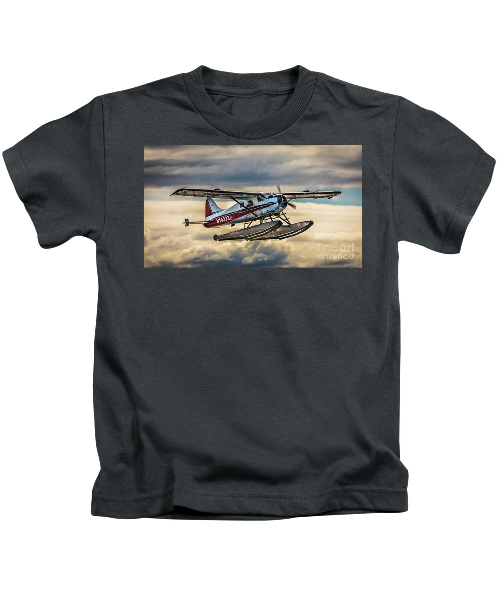 Seaplane Kids T-Shirt featuring the photograph Seaplane in the Anchorage sky by Lyl Dil Creations