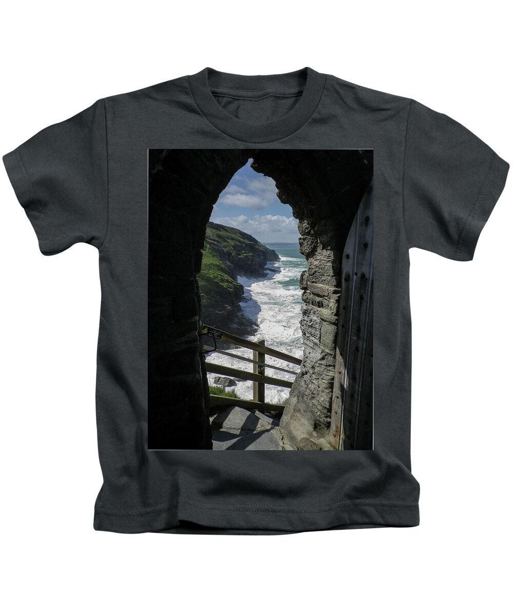 Tintagel Kids T-Shirt featuring the photograph Tintagel Castle Coast View Cornwall by Richard Brookes