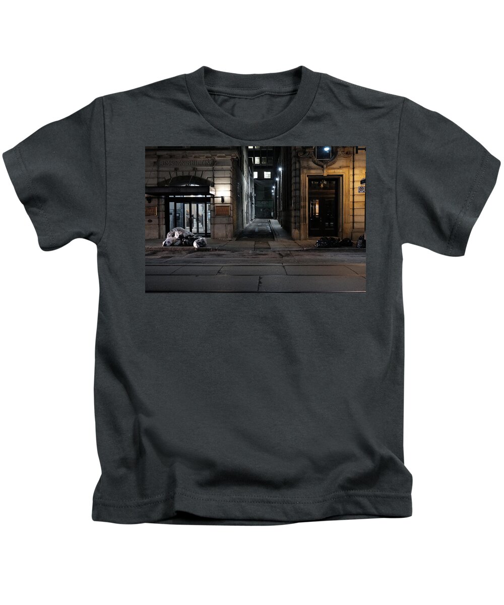  Kids T-Shirt featuring the photograph Two Doors Two Trash Piles by Kreddible Trout