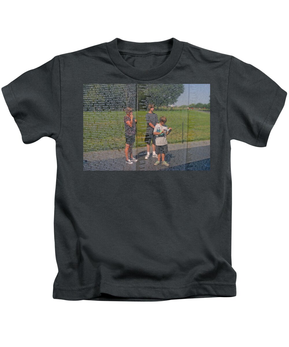 Vietnam Kids T-Shirt featuring the photograph Reflecting Upon the Fallen by Anthony Jones