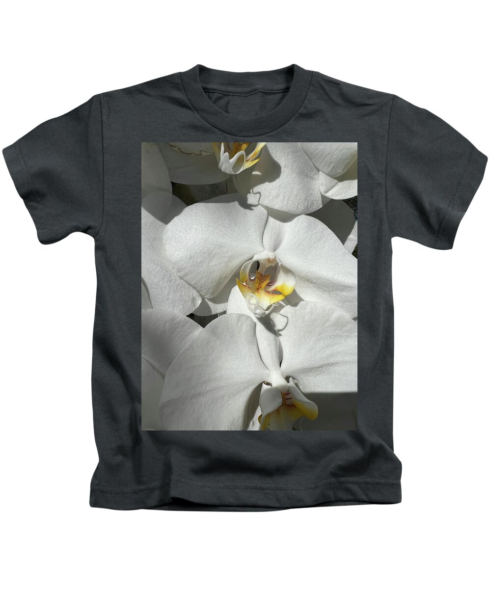Orchid Kids T-Shirt featuring the photograph White Orchid With Yellow #1 by Karen Zuk Rosenblatt