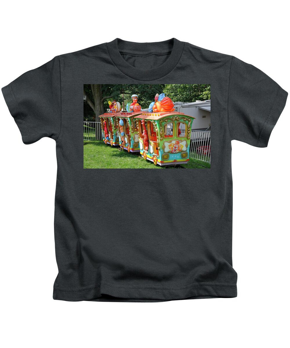 Child's Play Kids T-Shirt featuring the photograph A Child's Delight by Sarah McKoy