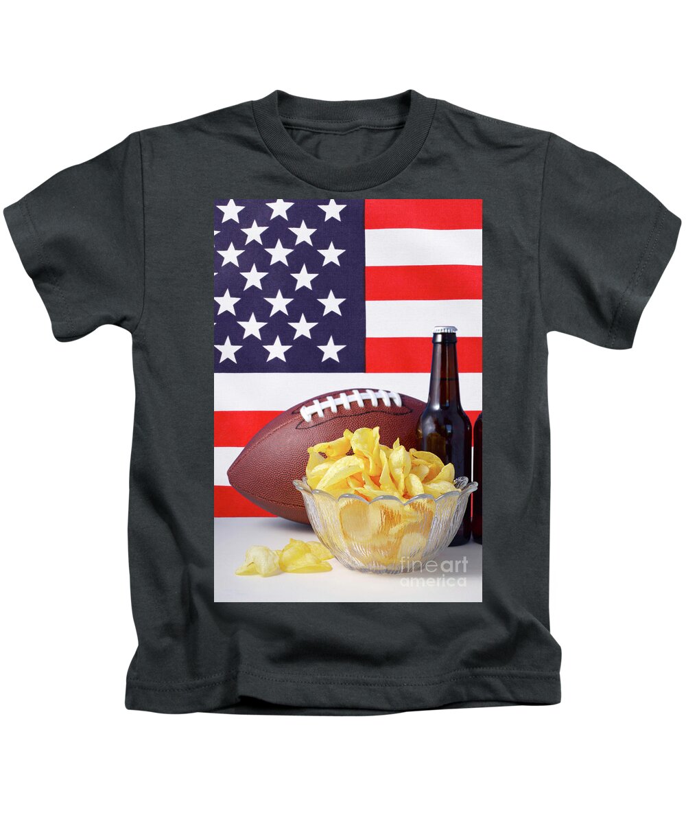 Beer Kids T-Shirt featuring the photograph American football with beer and chips. by Milleflore Images
