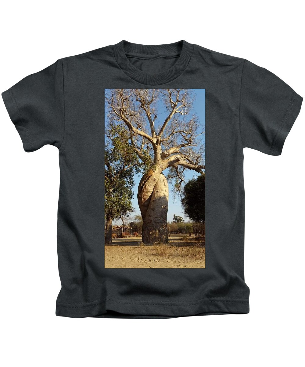 All Kids T-Shirt featuring the digital art An Old Tree in Baobab Alley in Madagascar KN8 by Art Inspirity