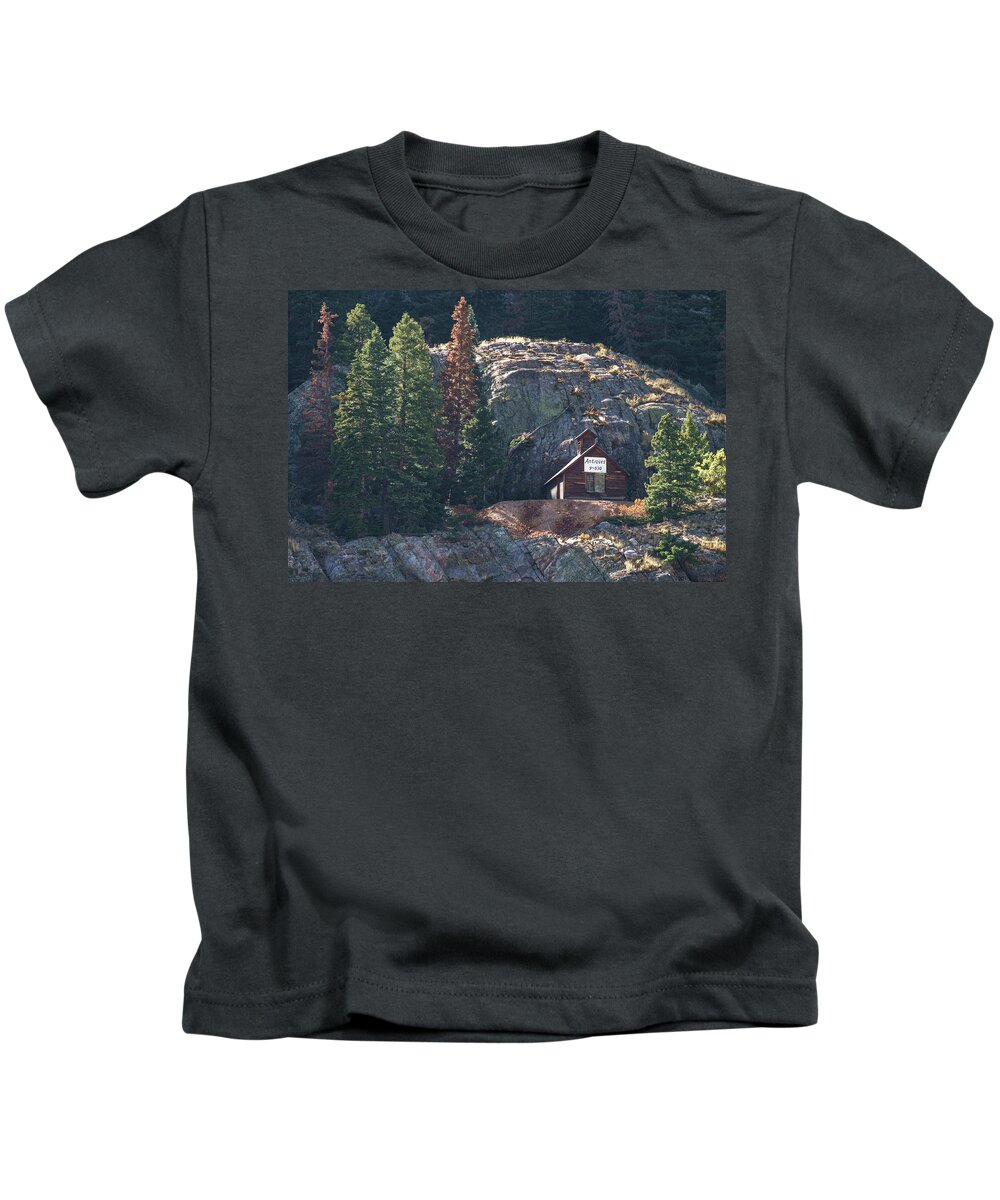 Antiques Kids T-Shirt featuring the photograph Antique Store in the Colorado Rocky Mountains by Mary Lee Dereske