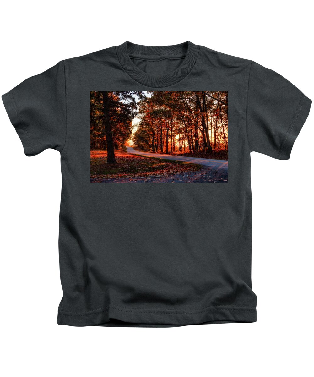Fall Kids T-Shirt featuring the photograph Autumn Sunset Through the Trees by Dan Carmichael