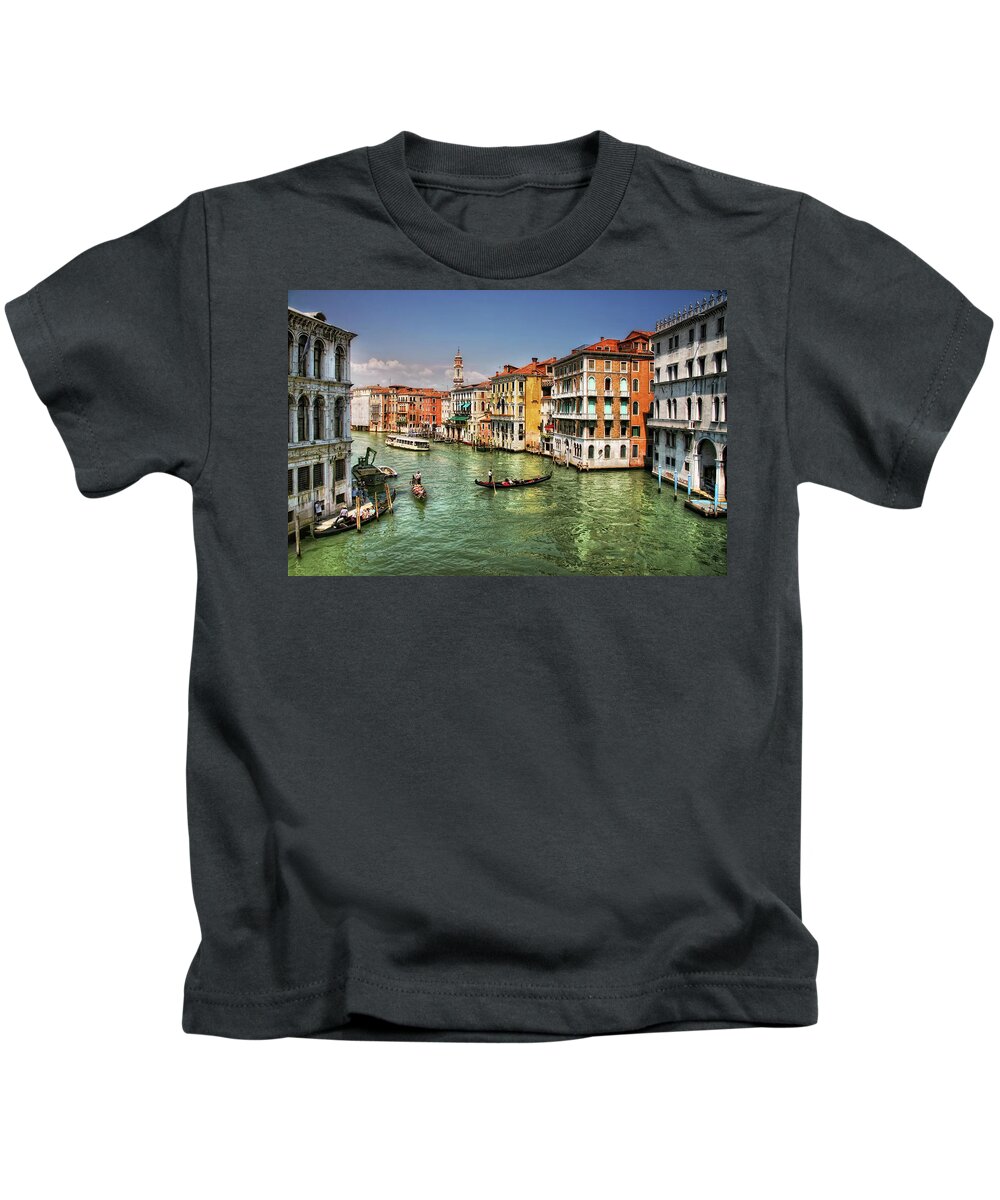 #venice #italy #canal #galagan #edgalagan #edwardgalagan #gondola #instagram #boat #artphotography #canon #sun #sky #art #photography #top10 #building #pier #dock #wharf #water #watertram Kids T-Shirt featuring the photograph Bright Day In Venice by Edward Galagan