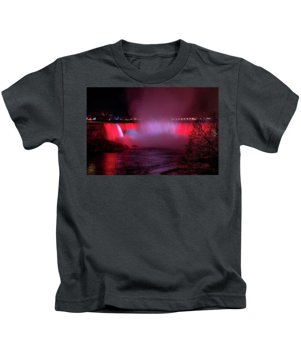 Niagara Kids T-Shirt featuring the photograph Canadian Falls at Niagara Lit in Red and White by John Twynam