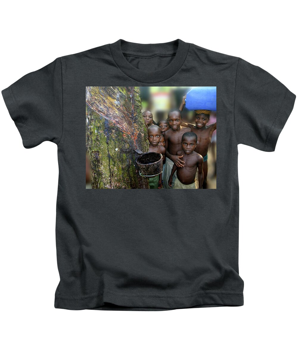 Boys Kids T-Shirt featuring the photograph Children of the Rubber Forest by Wayne King