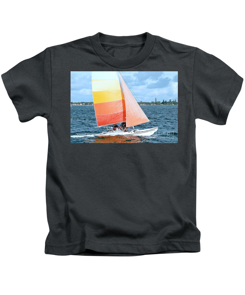 Sunnypicsoz.com Kids T-Shirt featuring the photograph Children Sailing racing boats. by Geoff Childs