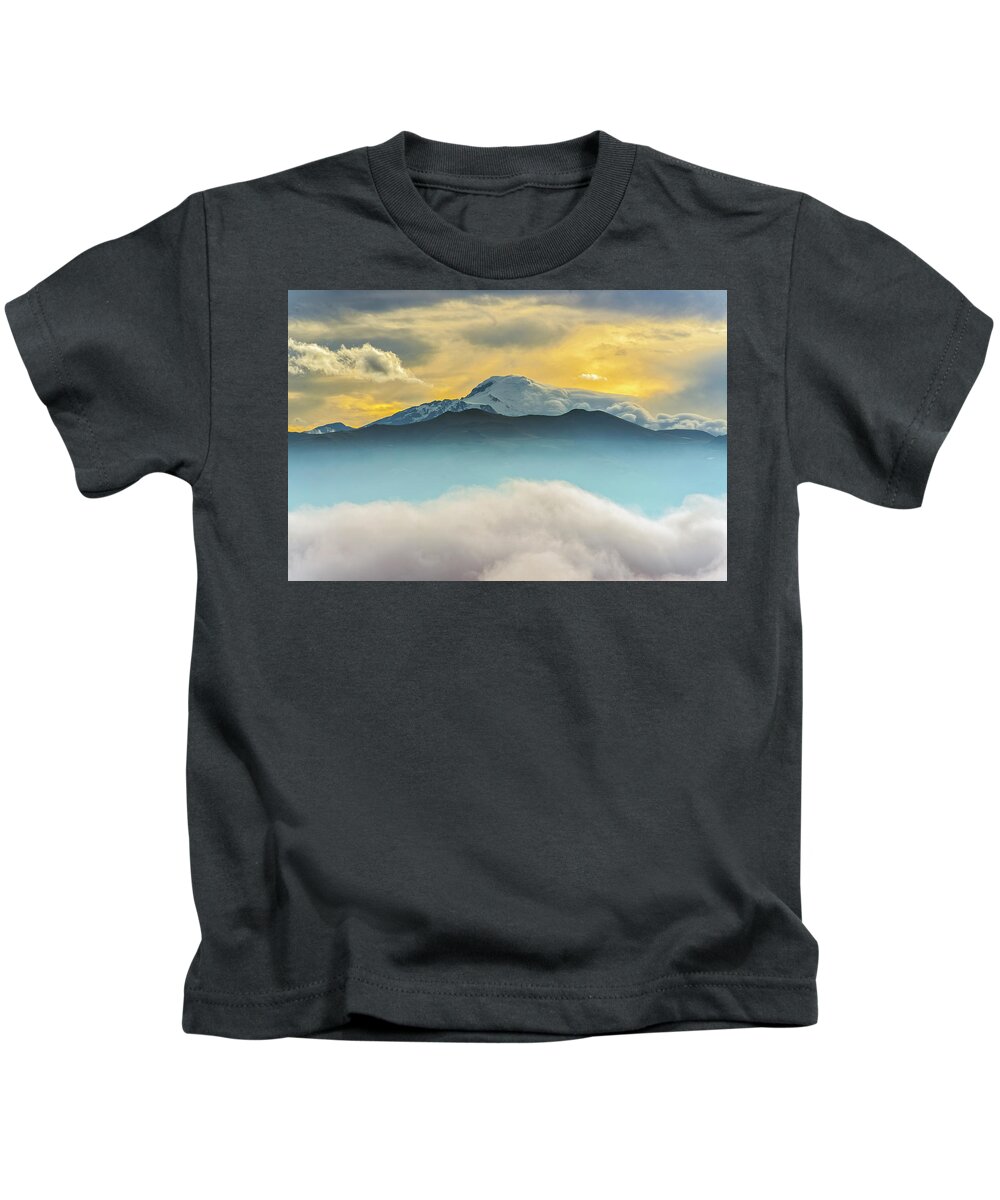 Andes Kids T-Shirt featuring the photograph Cloud bank and sunrise on the Cayambe volcano by Henri Leduc