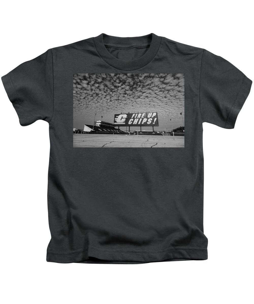 Central Michigan University Chippewas Kids T-Shirt featuring the photograph Fire Up Chips sign at Kelly Shorts Stadium wide shot in black and white by Eldon McGraw