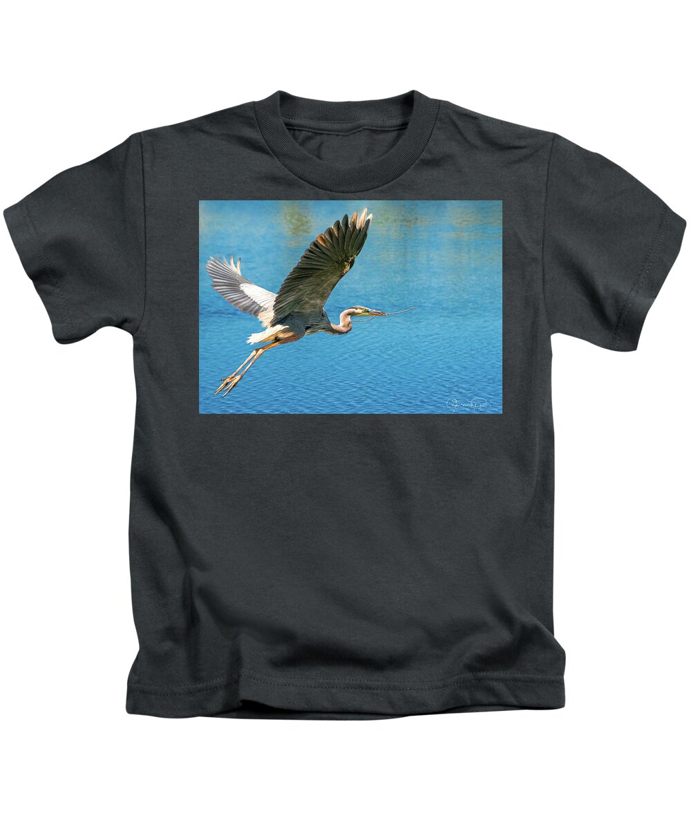 Heron Building Nest Kids T-Shirt featuring the photograph Heron Bearing Gifts by Susan Molnar