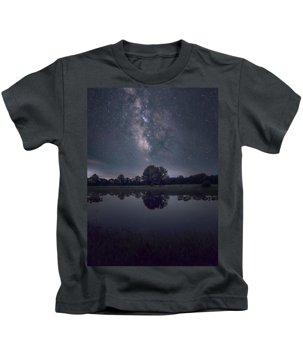 Nightscape Kids T-Shirt featuring the photograph Milky Way over the Pond by Grant Twiss