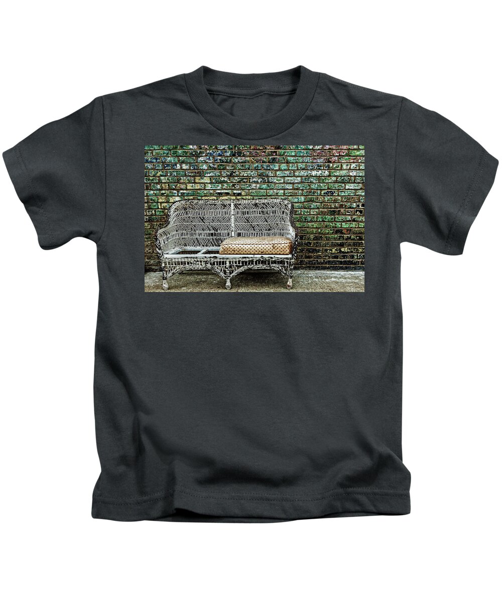 Settee Kids T-Shirt featuring the photograph Old Settee With One Cushion by Mike Schaffner